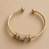 Lustrous Gold Charm Cuff Bracelet